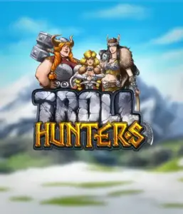 Графика игрового автомата "Troll Hunters" от Play'N Go, на котором представлены три воина-викинга: две женщины и один мужчина, облаченные в традиционные броню викингов. На фоне виднеются заснеженные горы, что создаёт атмосферу северных легенд. Этот игровой автомат идеален для поклонников викингских саг и поисков приключений.